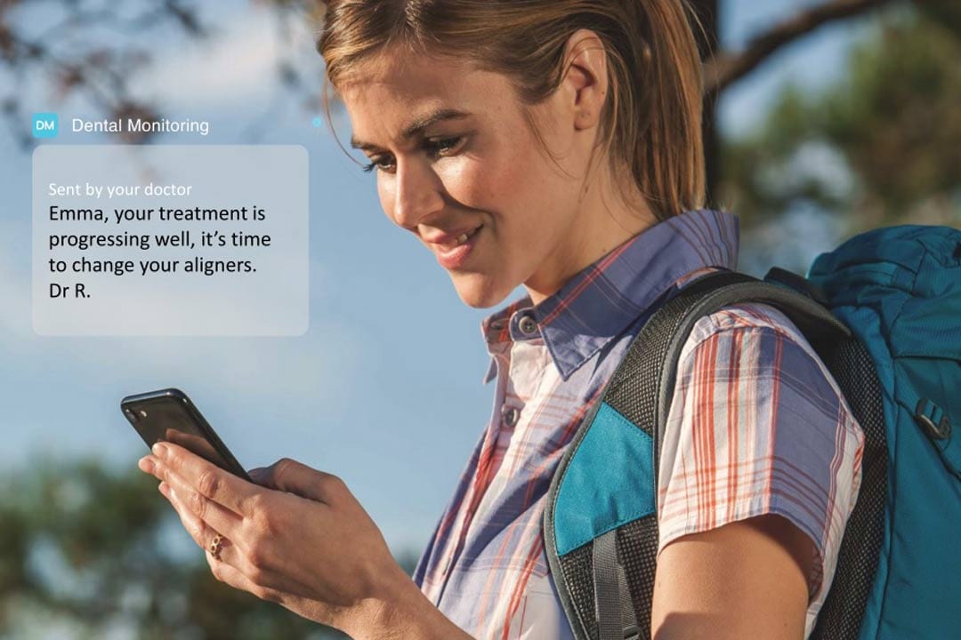 dental-monitoring-constant-communication dental monitoring app notification telling patient that progress is good and no dental review is required for the month