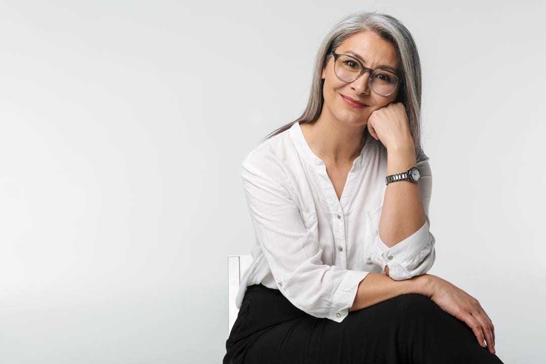 image-of-adult-mature-woman-wearing-eyeglasses-and-9RRD43X happy man with dental bridge