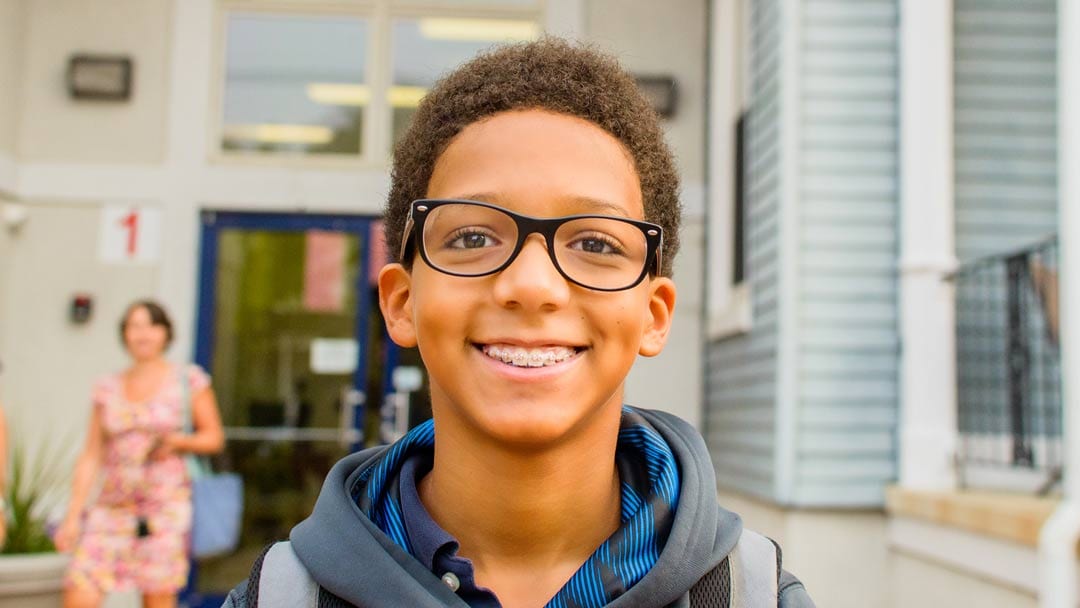 young child wearing braces