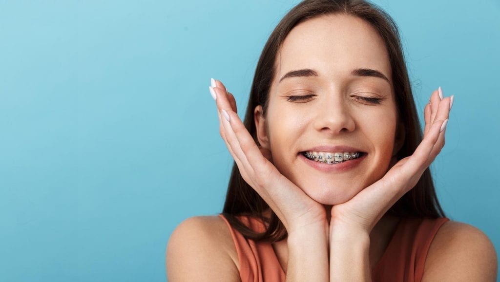 lady smiling with her braces in singapore