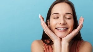 lady smiling with her braces in singapore